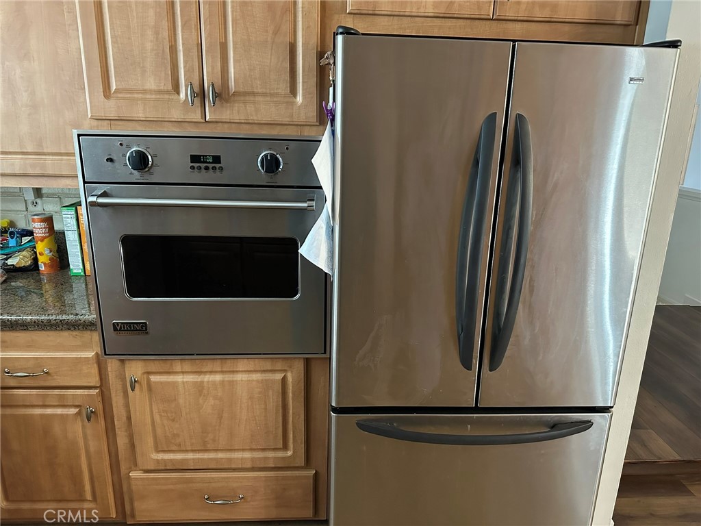2752 Wanda Avenue Simi Valley, CA 93065 - Photo 13 of 40 a refrigerator freezer sitting inside of a kitchen