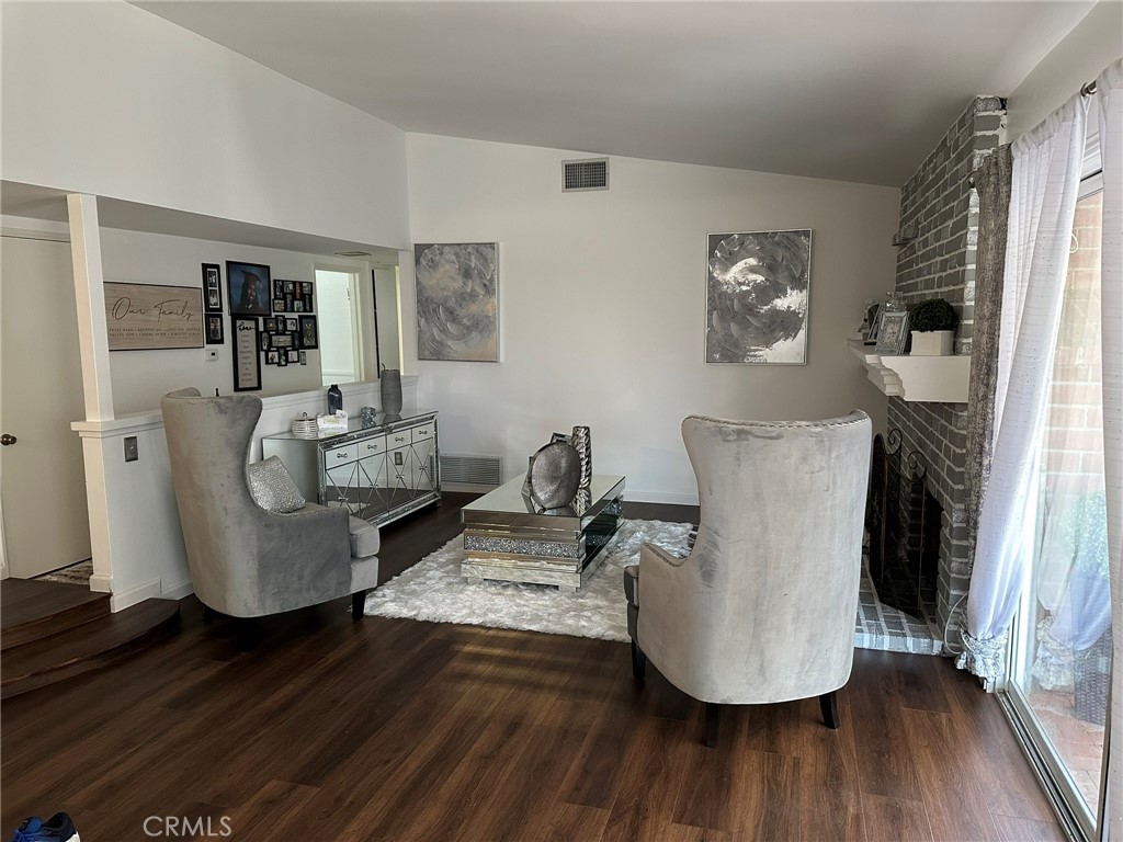 2752 Wanda Avenue Simi Valley, CA 93065 - Photo 15 of 40 a living room with furniture and wooden floor