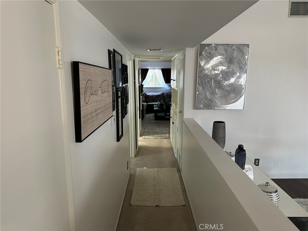 2752 Wanda Avenue Simi Valley, CA 93065 - Photo 16 of 40 a hallway with a view of living room