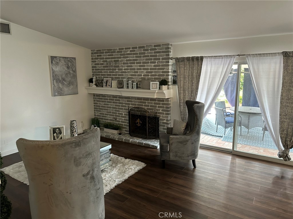 2752 Wanda Avenue Simi Valley, CA 93065 - Photo 5 of 40 a living room with furniture and a fireplace