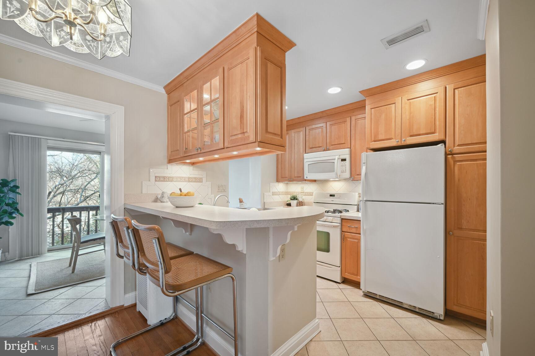 2020 Tunlaw Road Northwest Washington, DC 20007 - Photo 12 of 33 Kitchen with lots of storage