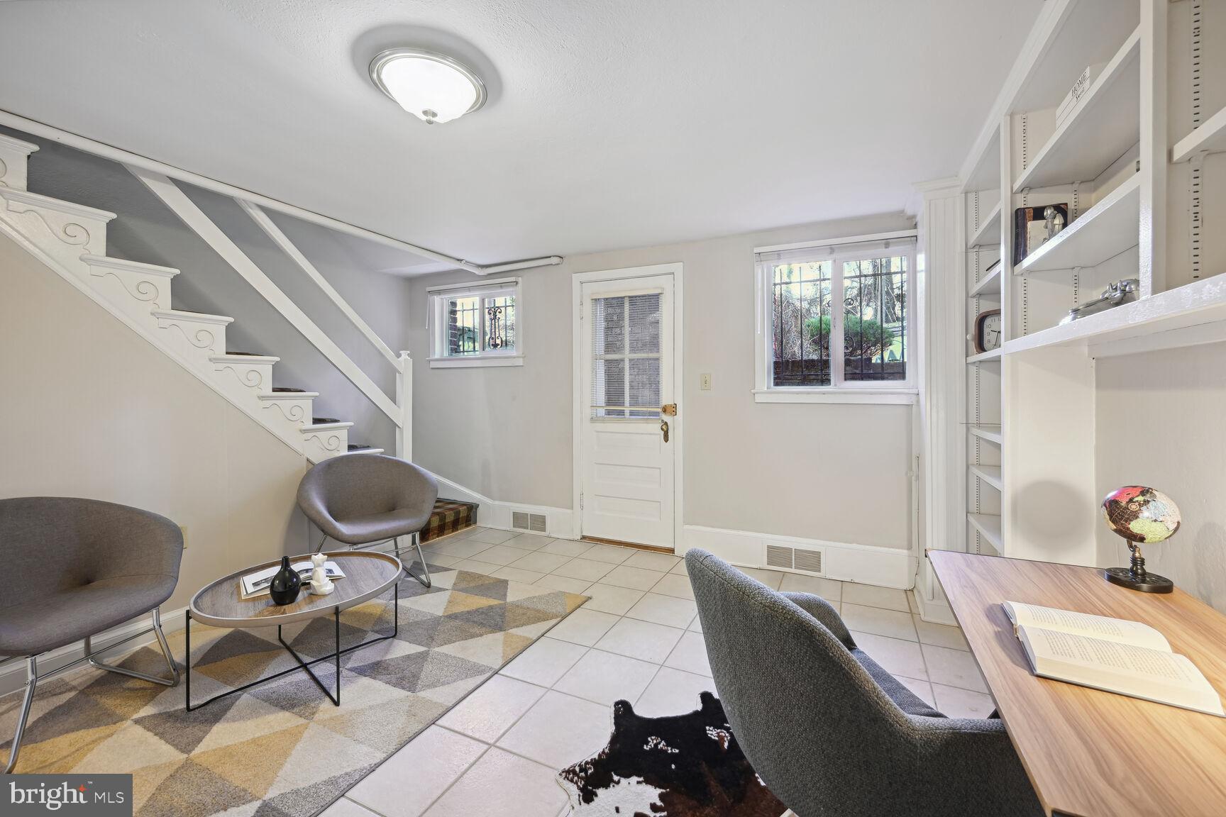 2020 Tunlaw Road Northwest Washington, DC 20007 - Photo 22 of 33 Rec Room with door to Front Yard