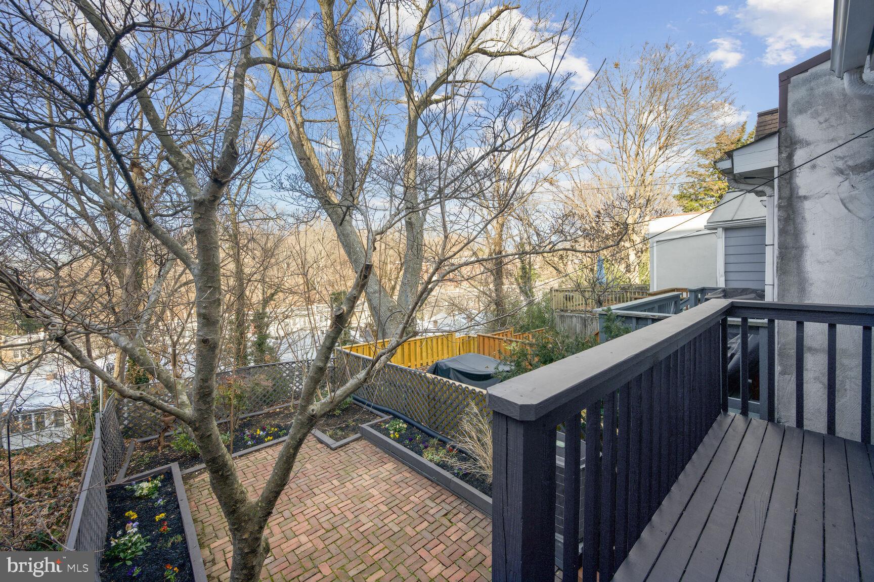 2020 Tunlaw Road Northwest Washington, DC 20007 - Photo 28 of 33 Deck leading to Back Yard