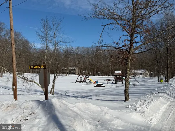 a view of snow on the road