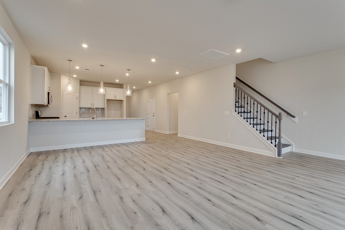 1310 Kristopher Drive Lebanon, TN 37087 - Photo 14 of 34 a view of kitchen with cabinets wooden floor and outdoor space