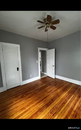 a view of room and wooden floor