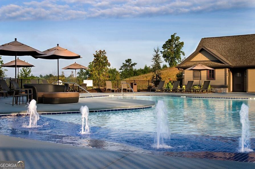 42 Lookout Point Toccoa, GA 30577 - Photo 26 of 26 a view of pool with lawn chairs under an umbrella