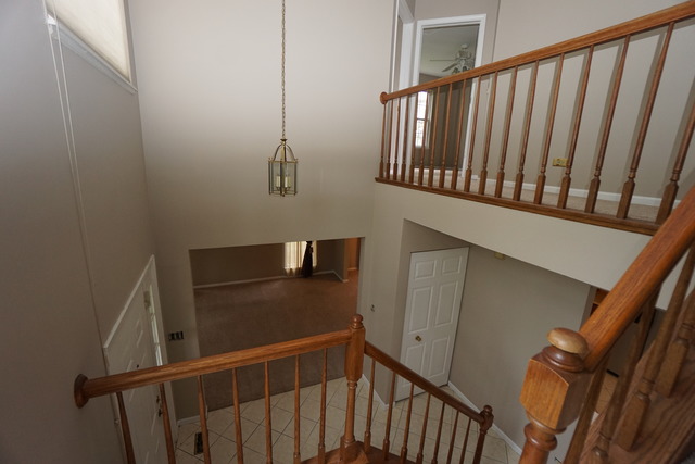 1129 Coldspring Road Elgin, IL 60120 - Photo 3 of 18 a view of a balcony with staircase