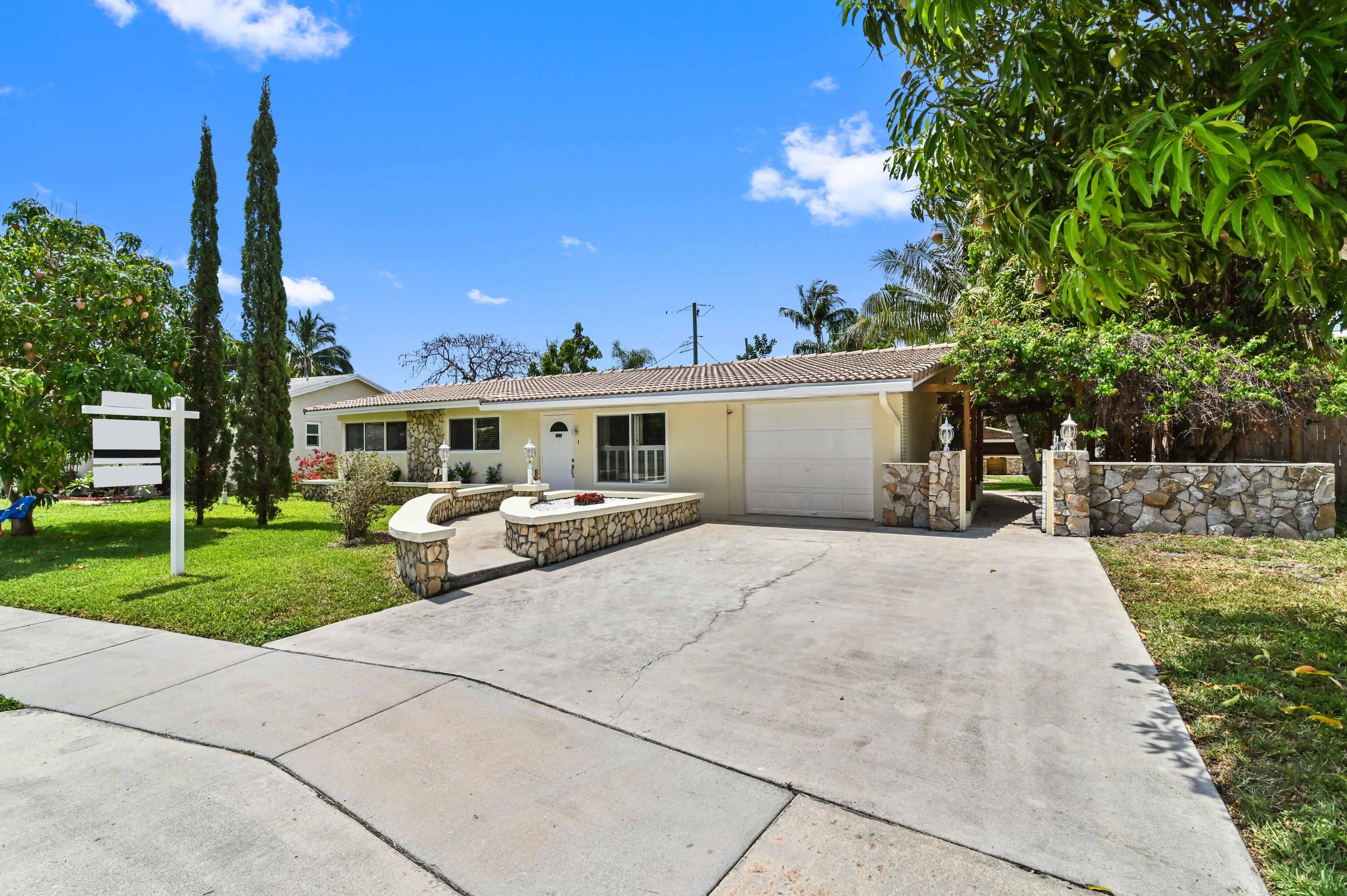 284 Northwest 46th Street Boca Raton, FL 33431 - Photo 3 of 37 02 Front 02