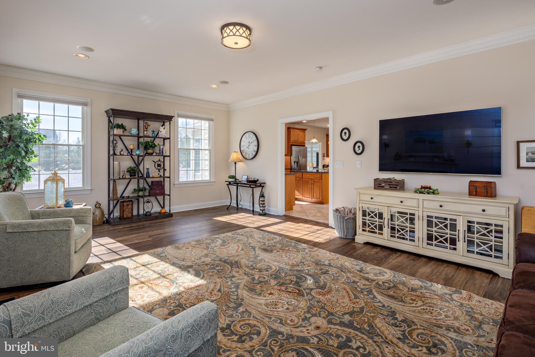 115 Cedar Road Chester, MD 21619 - Photo 13 of 71 a living room with furniture and a flat screen tv