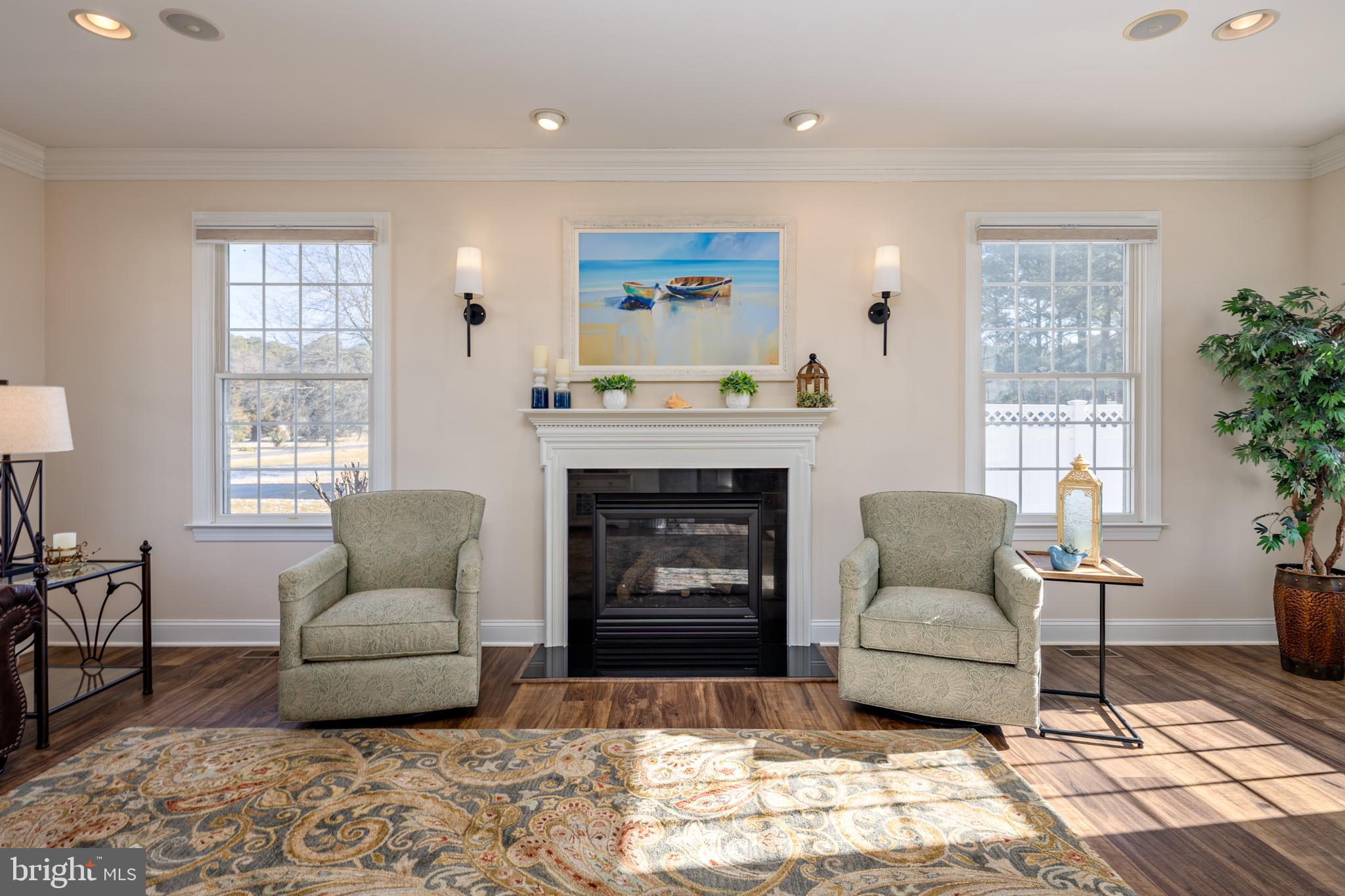 115 Cedar Road Chester, MD 21619 - Photo 16 of 71 a living room with furniture and a fireplace