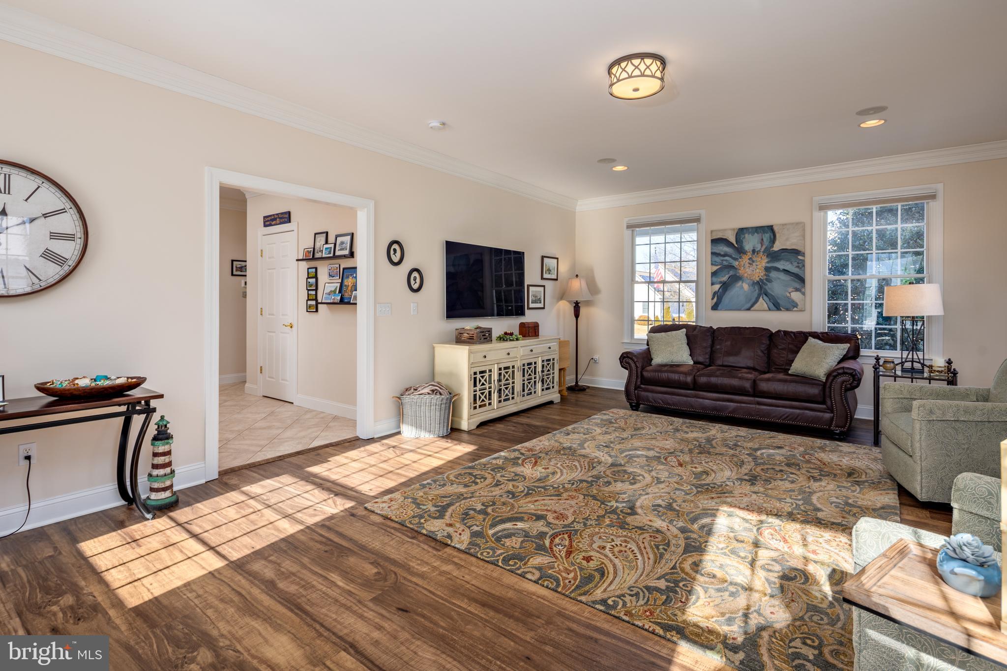 115 Cedar Road Chester, MD 21619 - Photo 17 of 71 a living room with furniture and a flat screen tv