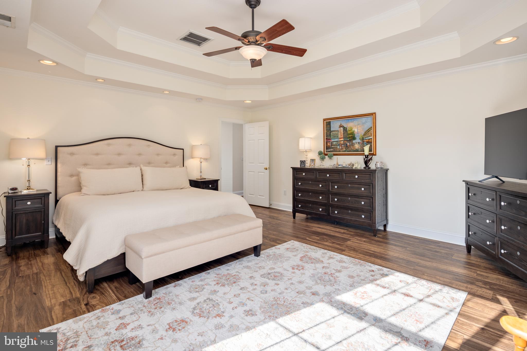 115 Cedar Road Chester, MD 21619 - Photo 29 of 71 a bedroom with a bed and a television