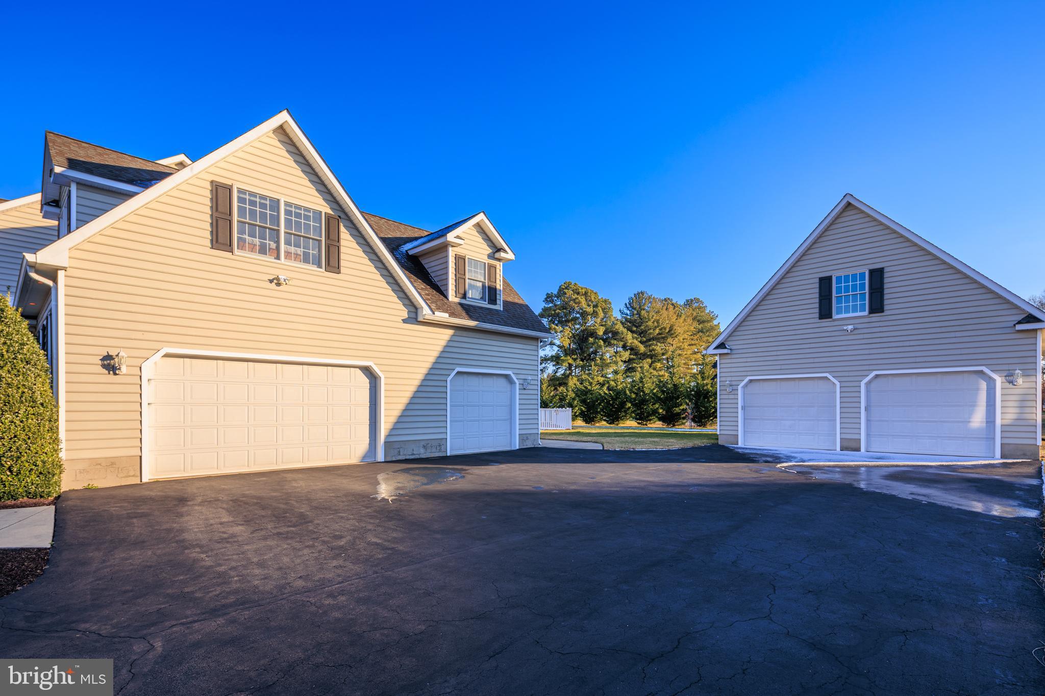 115 Cedar Road Chester, MD 21619 - Photo 66 of 71 a view of a house with a yard and garage