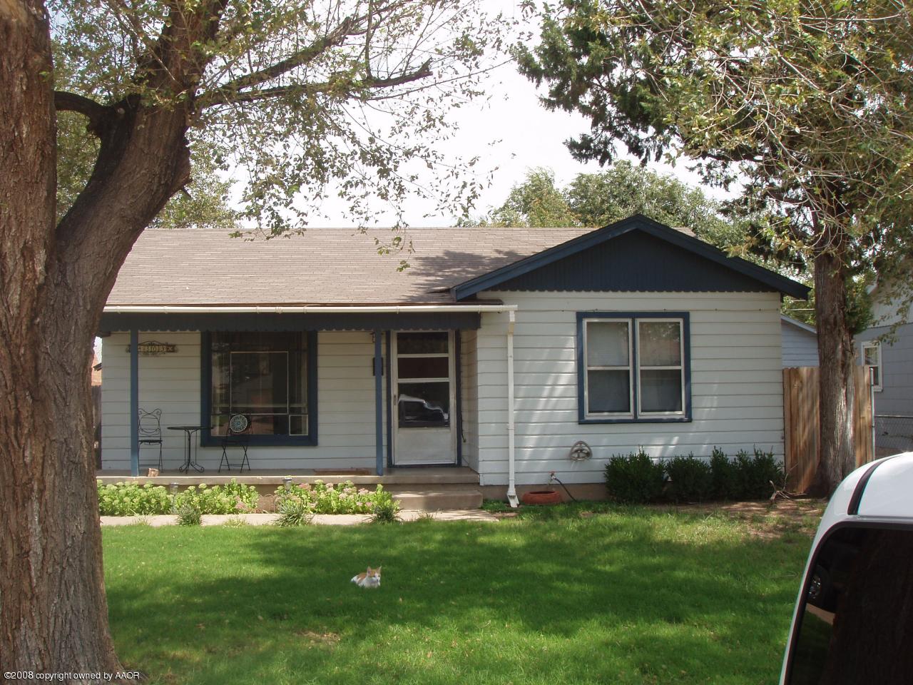 4303 South Jackson Street Amarillo, TX 79110 - Photo 1 of 18 a front view of a house with a yard