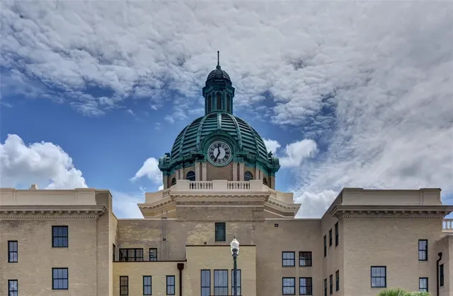 a close view of a chandelier in front of a house