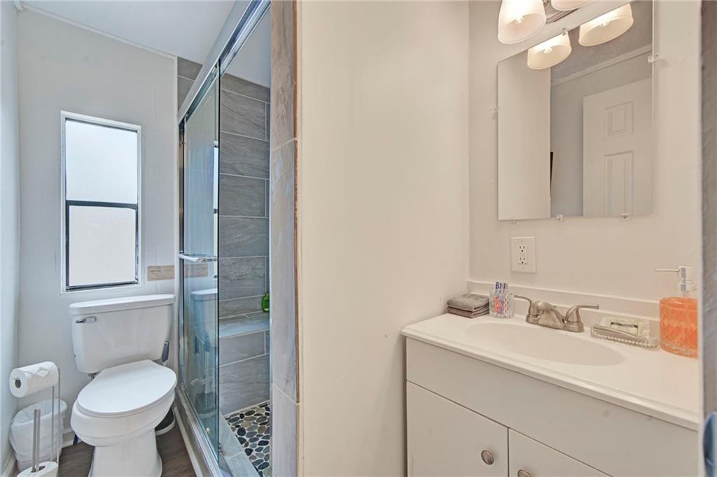 167 Jasmine Drive Ranger, GA 30734 - Photo 12 of 38 a bathroom with a sink toilet and shower