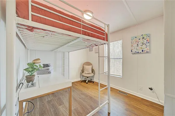 a room with furniture and a window
