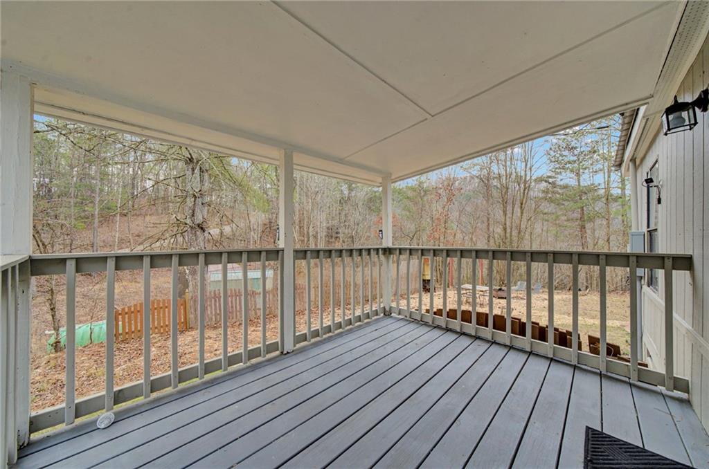 167 Jasmine Drive Ranger, GA 30734 - Photo 19 of 38 a view of a balcony with wooden floor