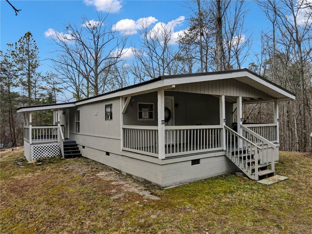 167 Jasmine Drive Ranger, GA 30734 - Photo 25 of 38 a view of a house with a yard