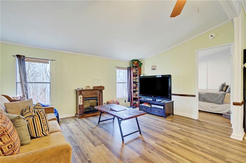 167 Jasmine Drive Ranger, GA 30734 - Photo 8 of 38 a living room with furniture and a flat screen tv
