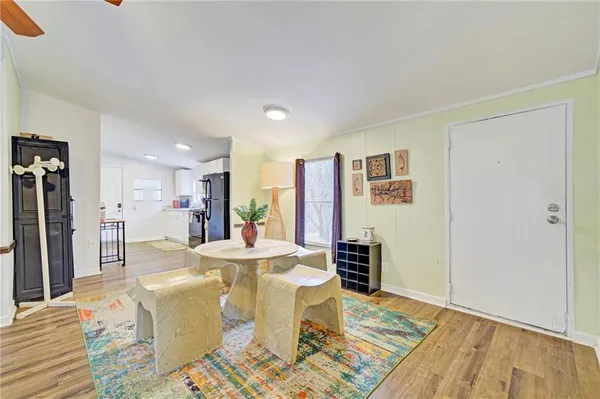 a view of a dining room with furniture