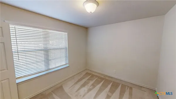 a view of a livingroom with a window