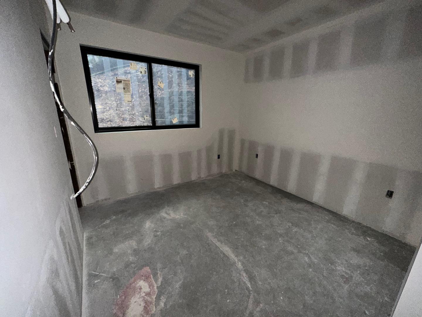 7032 Sayre Drive Oakland, CA 94611 - Photo 23 of 38 a view of a hallway with window