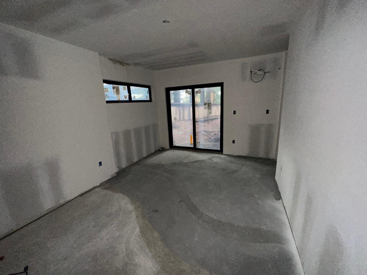 7032 Sayre Drive Oakland, CA 94611 - Photo 25 of 38 a view of empty room with windows