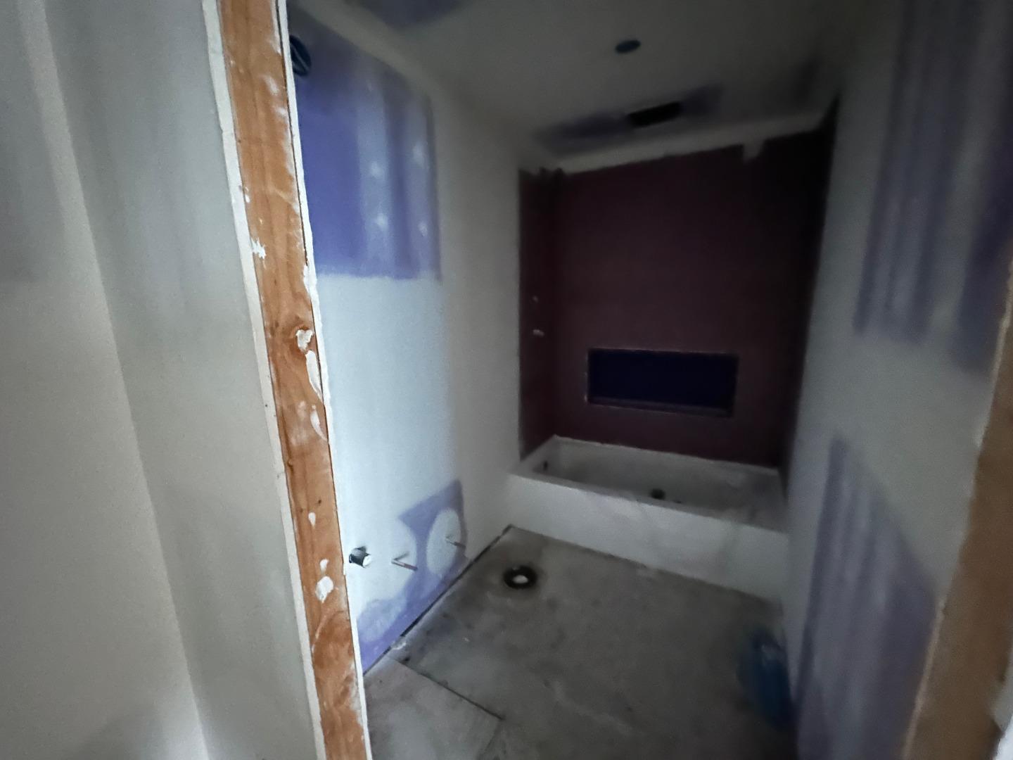 7032 Sayre Drive Oakland, CA 94611 - Photo 6 of 38 a bathroom with a bathtub