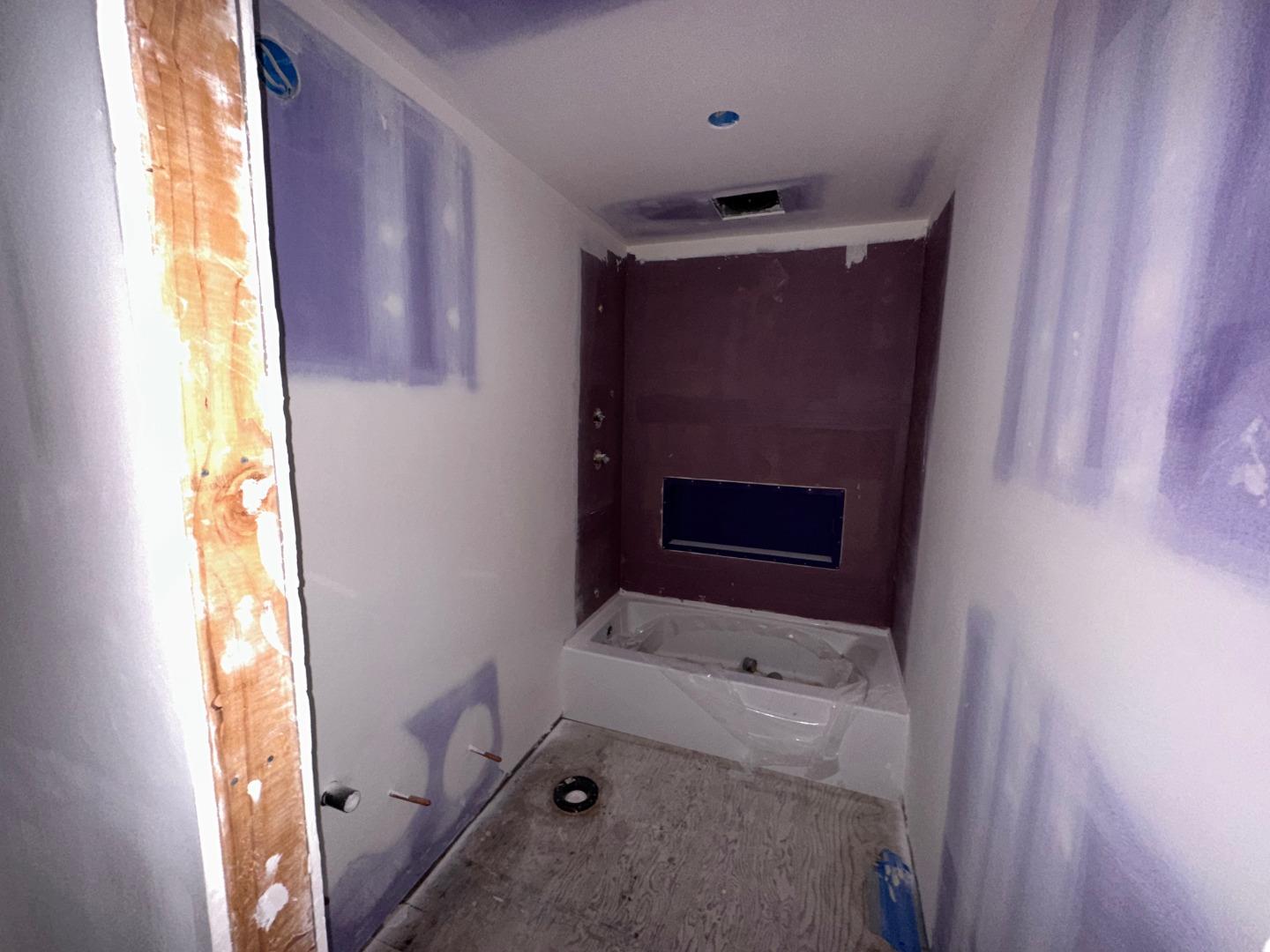 7032 Sayre Drive Oakland, CA 94611 - Photo 7 of 38 a room with a fireplace and a window