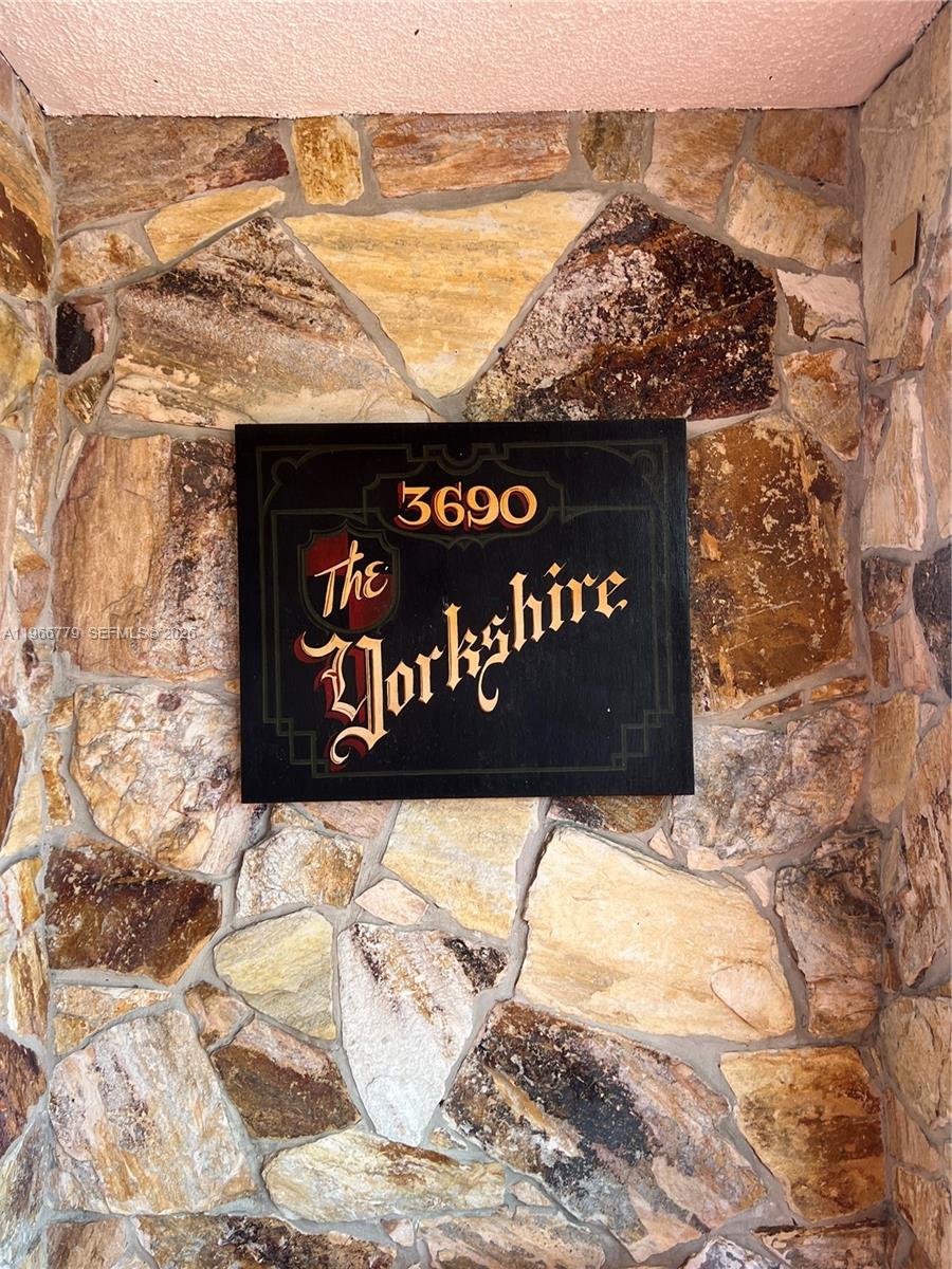 3690 Inverrary Drive, Unit 1K Lauderhill, FL 33319 - Photo 2 of 34 a view of a wooden floor with a lake view