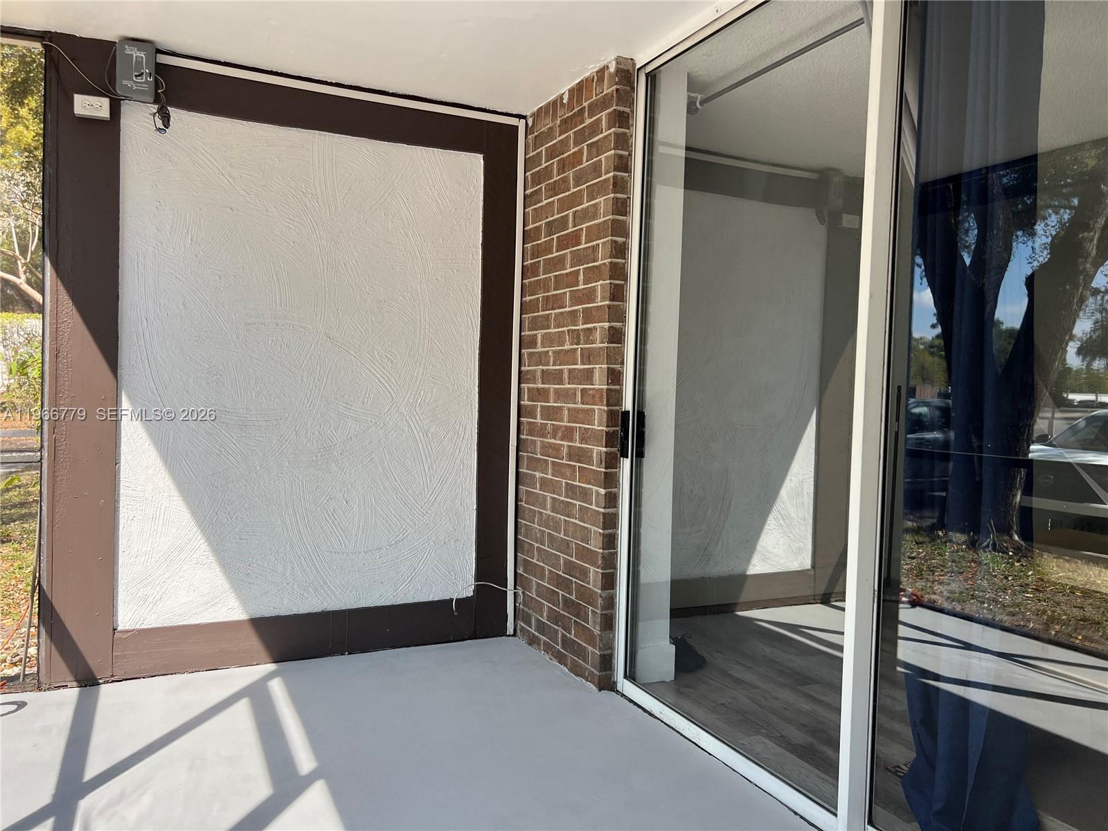 3690 Inverrary Drive, Unit 1K Lauderhill, FL 33319 - Photo 26 of 34 a view of front door and porch