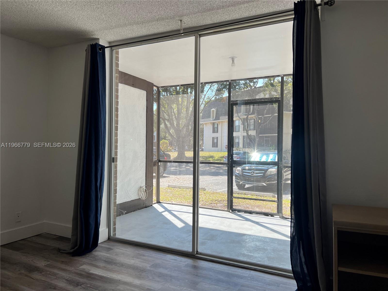 3690 Inverrary Drive, Unit 1K Lauderhill, FL 33319 - Photo 29 of 34 a view of front door with wooden floor