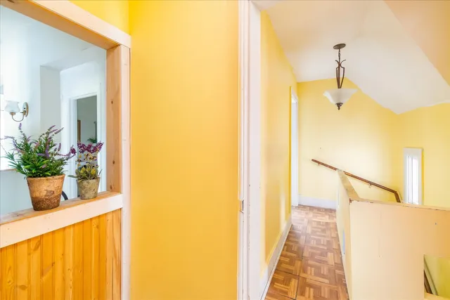 a view of livingroom and hardwood floor