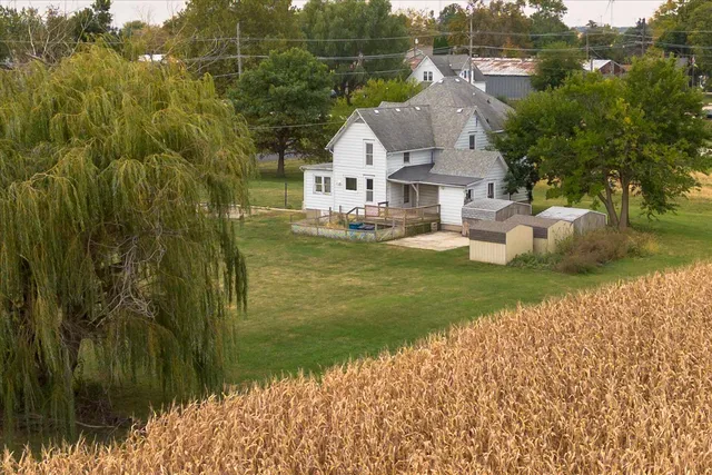 a view of a house with a yard