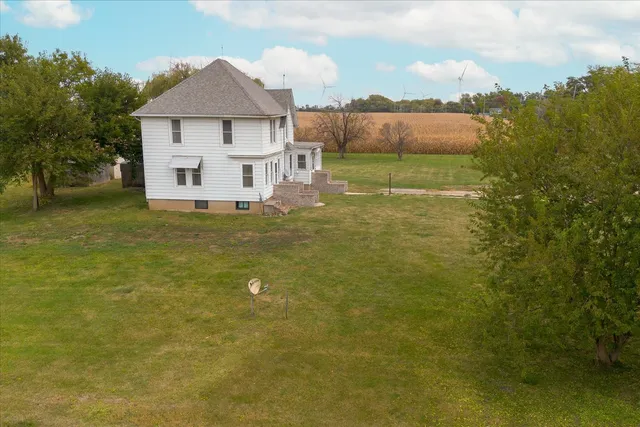 a view of a house with a big yard