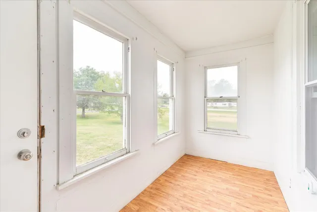 a view of an empty room and window