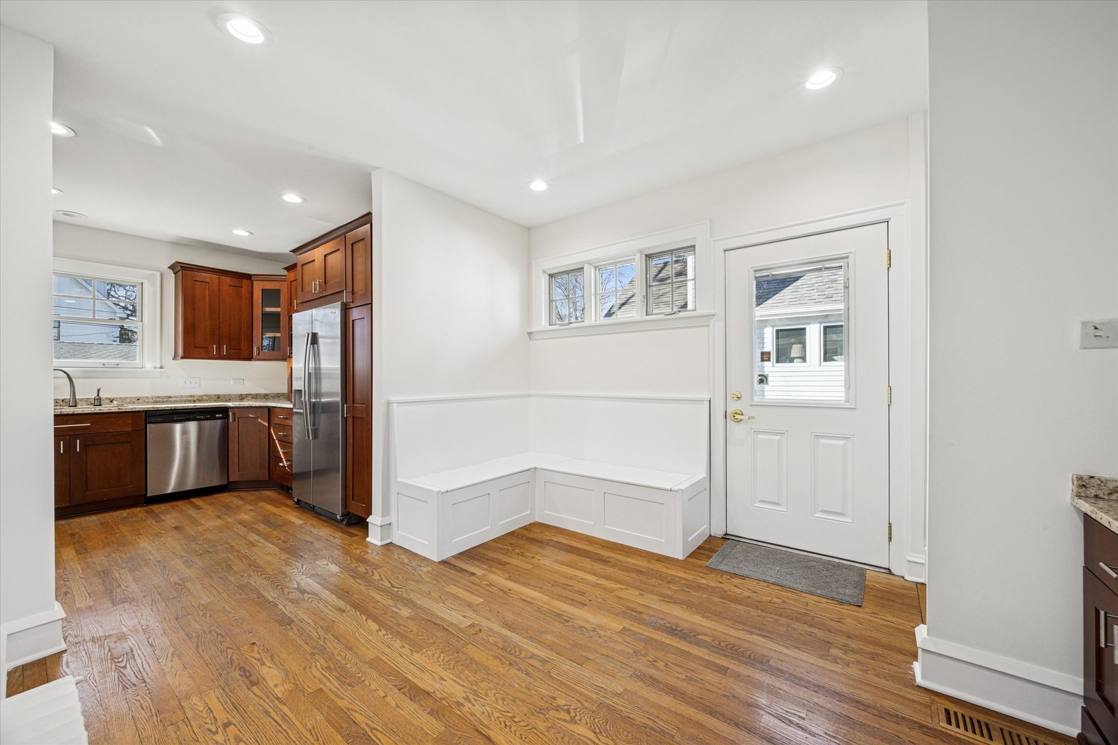 3946 Howard Avenue Western Springs, IL 60558 - Photo 11 of 28 a view of a kitchen with a sink and a refrigerator