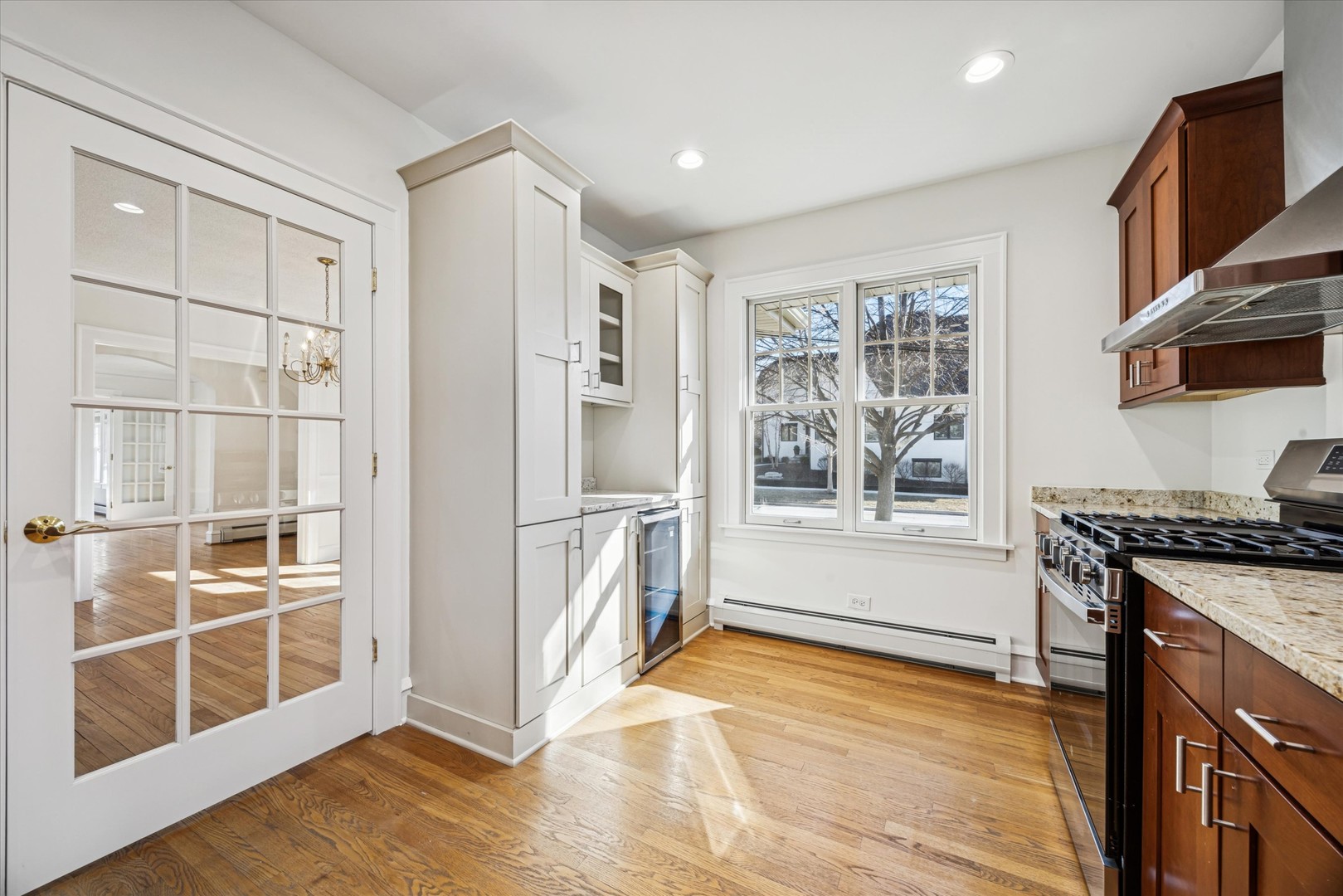 3946 Howard Avenue Western Springs, IL 60558 - Photo 13 of 28 a view of a kitchen with wooden floor and electronic appliances