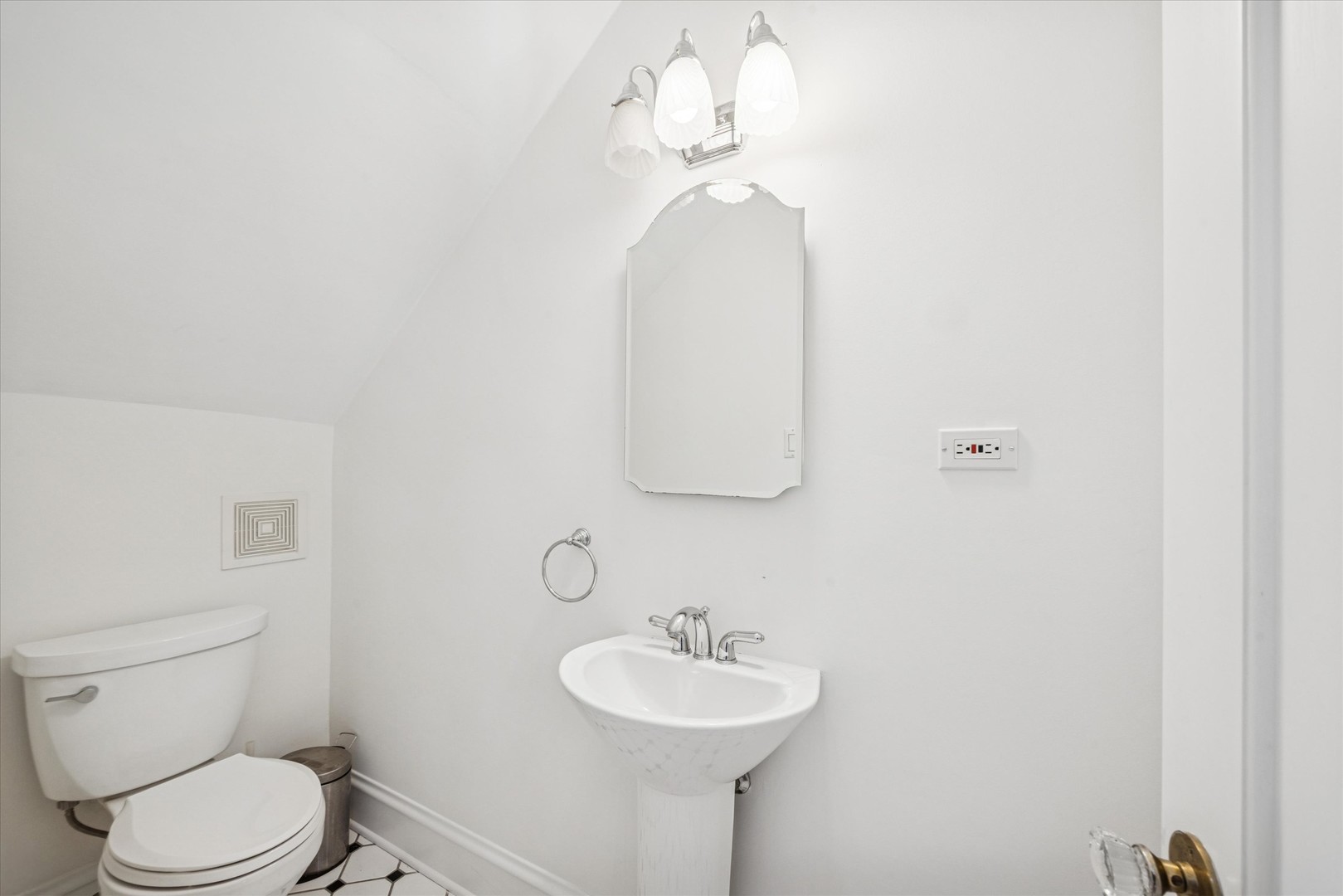 3946 Howard Avenue Western Springs, IL 60558 - Photo 14 of 28 a bathroom with a sink a toilet and a mirror