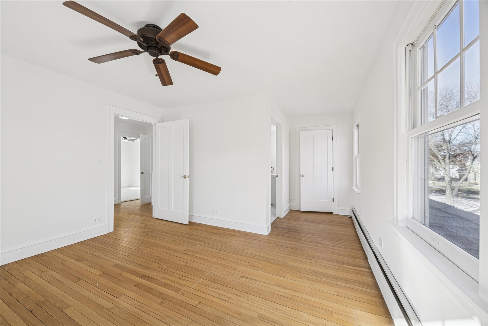 3946 Howard Avenue Western Springs, IL 60558 - Photo 16 of 28 wooden floor in an empty room with a window