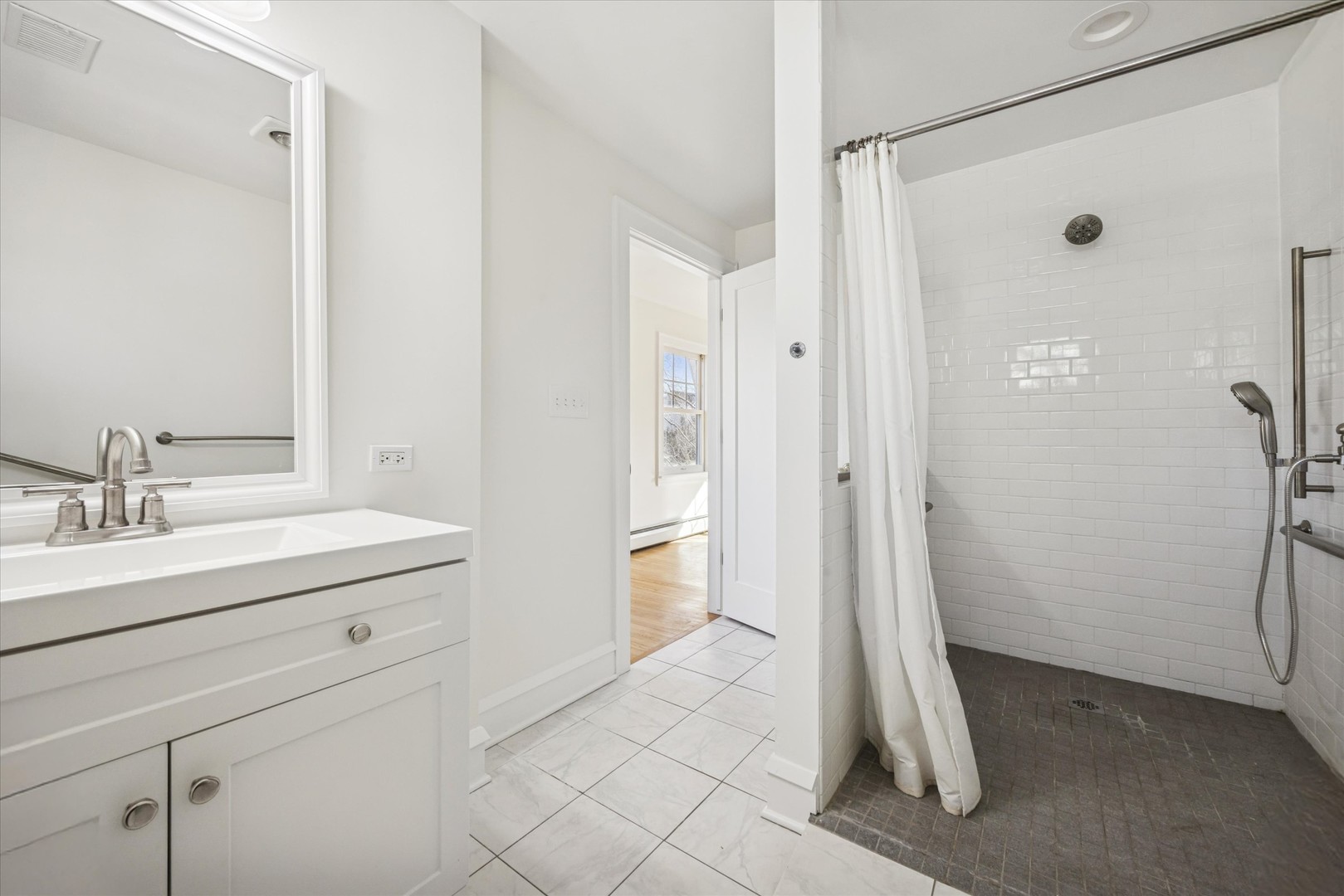 3946 Howard Avenue Western Springs, IL 60558 - Photo 17 of 28 a bathroom with a sink and a mirror