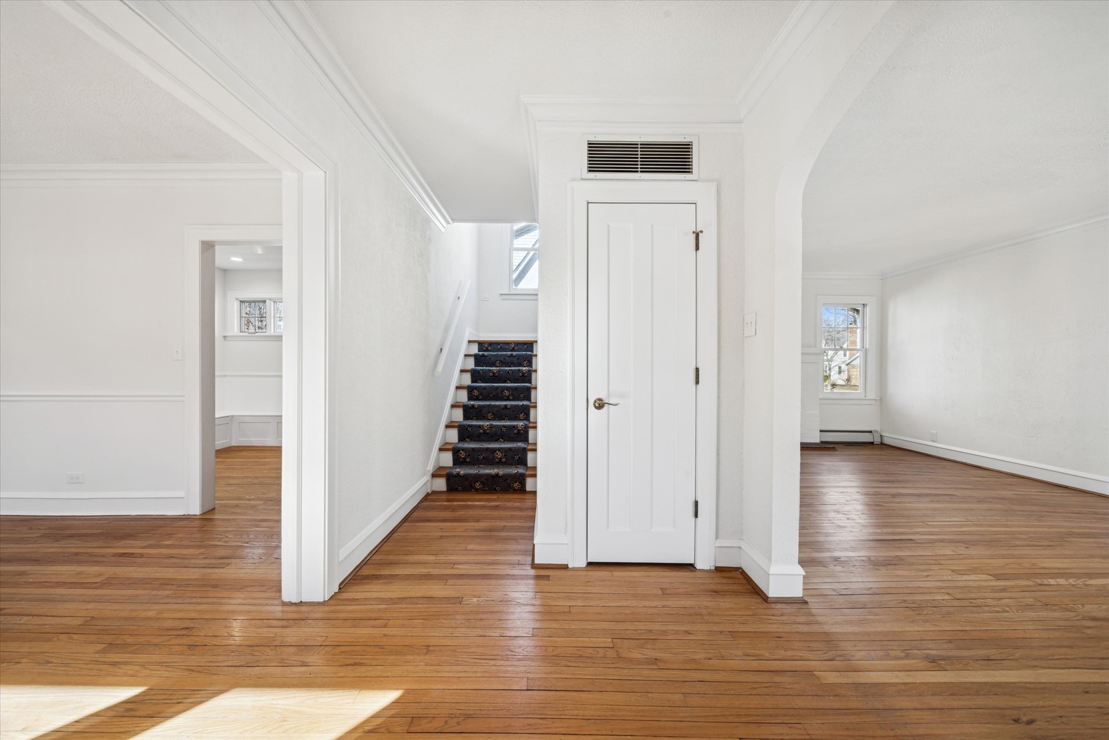 3946 Howard Avenue Western Springs, IL 60558 - Photo 2 of 28 a view of a hallway with wooden floor and staircase