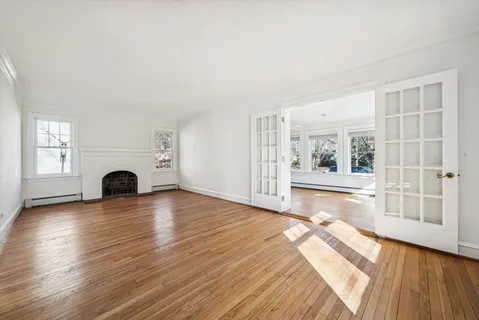 a view of livingroom with furniture and a fireplace