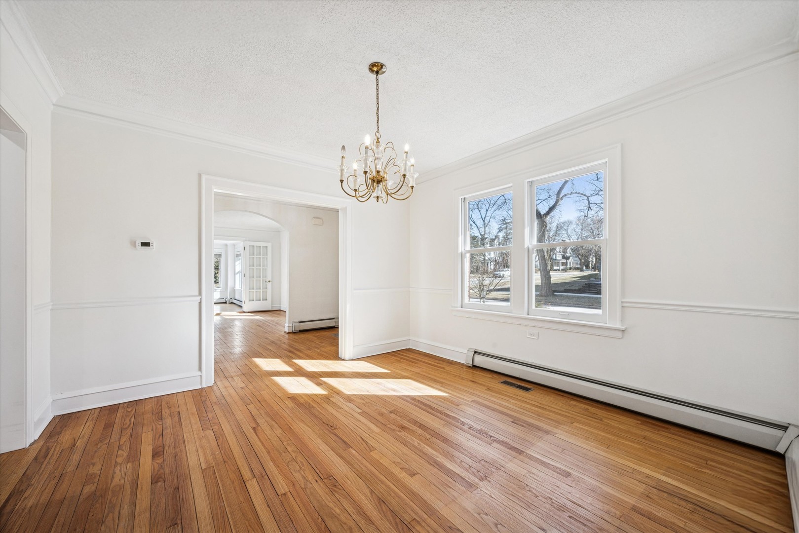3946 Howard Avenue Western Springs, IL 60558 - Photo 9 of 28 a view of livingroom with window and wooden floor