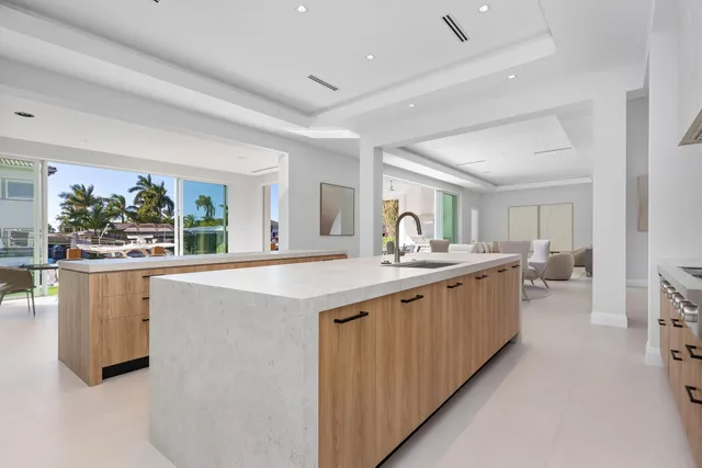 a bedroom with furniture and a potted plant