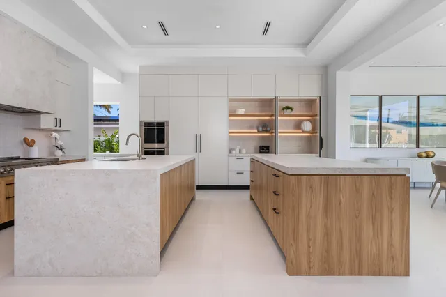 a dinning table and chairs in the garden
