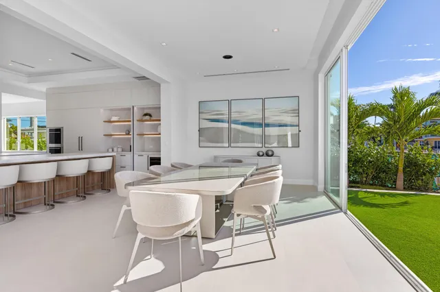 a vase of flowers sitting on a table