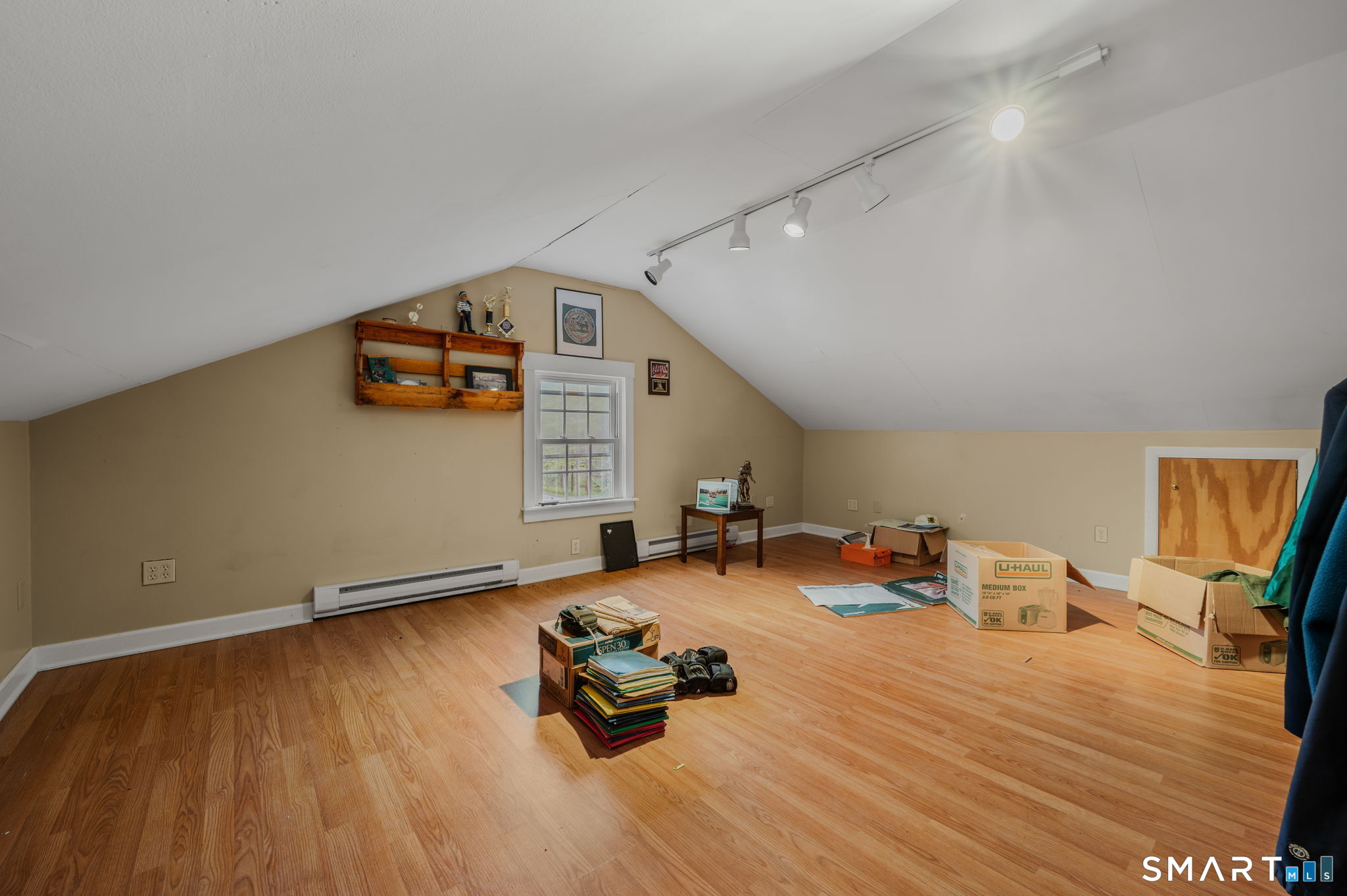 414 Main Street Sprague, CT 06330 - Photo 17 of 34 a room with furniture and a wooden floor